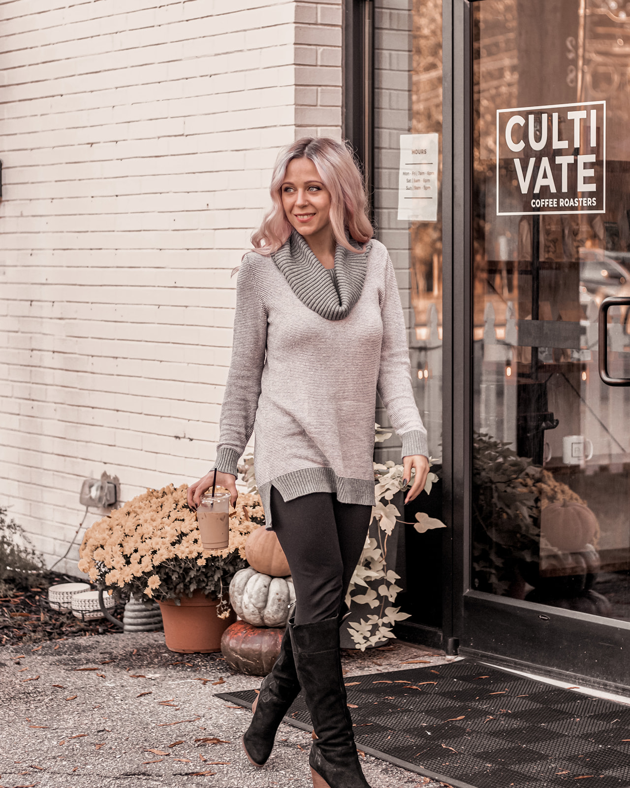 WOMAN-WALKING-WITH-COFFEE-IN-THE-FALL