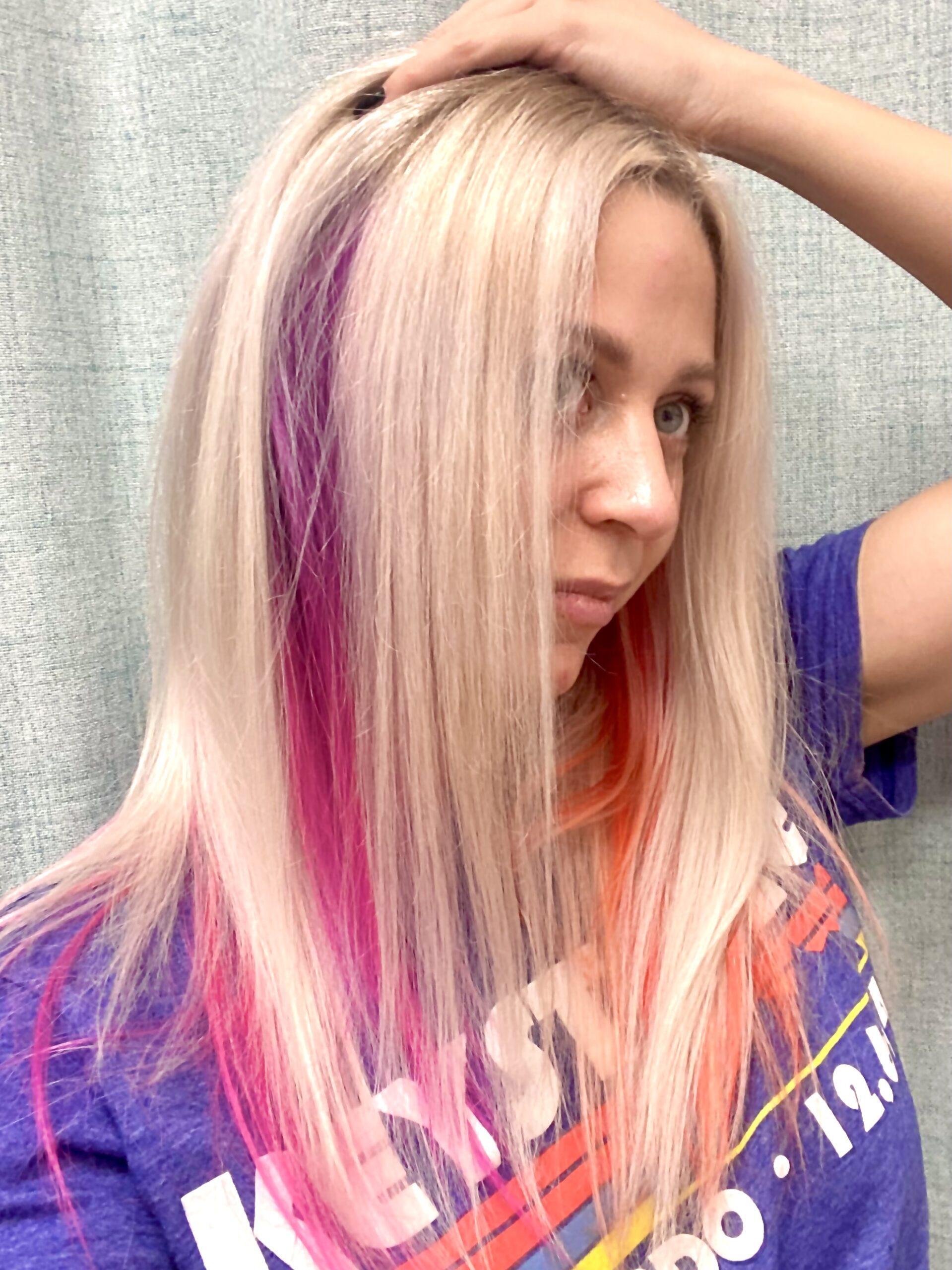 PEEKABOO-HIGHLIGHTS-ON-BLONDE-HAIR-WITH-PURPLE-PINK-AND-ORANGE